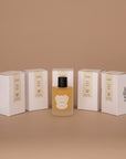 Five Vellie Wrap Sprays displayed together in the scent Love each crafted with the finest raw materials and expertly blended by a Paris-trained Seattle-based Master Perfumer. Handmade by women with love.