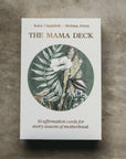 Packaging of The Mama Deck exterior of box has illustrated flowers. Inside is a set of 50 affirmation cards created by women-owned and Latina-owned business, designed to support and empower mothers.