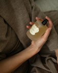 A clean beauty all natural spray in the scent Open made by Paris-trained master perfumer in Seattle, Wa. Designed to spray on the Vellie Wrap.