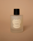 Vellie Wrap Spray in Calm scent. Infused with calming bergamot, chamomile, and lavender to enhance the soothing experience of when wearing your Vellie baby alpaca wrap.