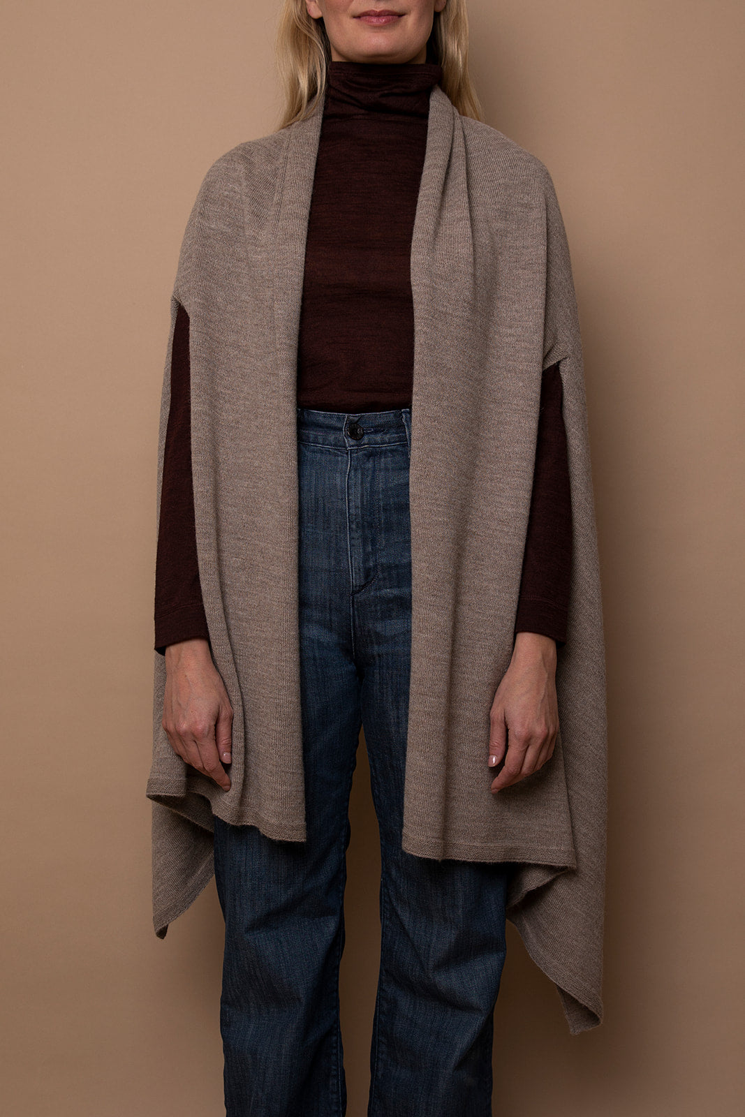 The Vellie Wraps are designed with armholes for effortless easy movement. Can also be worn in various ways like a shawl, scarf, or extra alpaca layer.