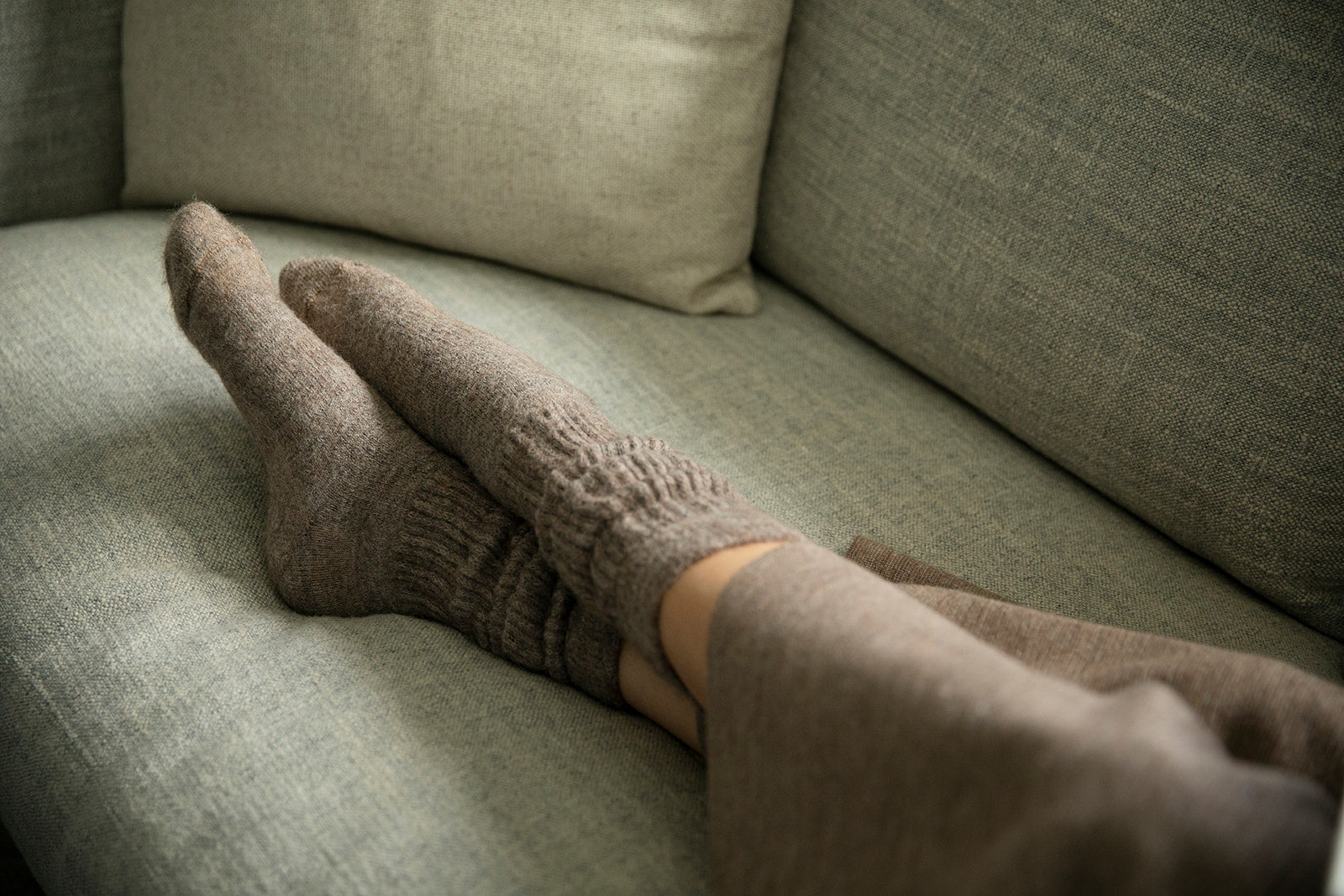 Set of soft alpaca socks. Warm, comfortable feet signal safety. When your foundation feels secure, your entire nervous system can exhale. 