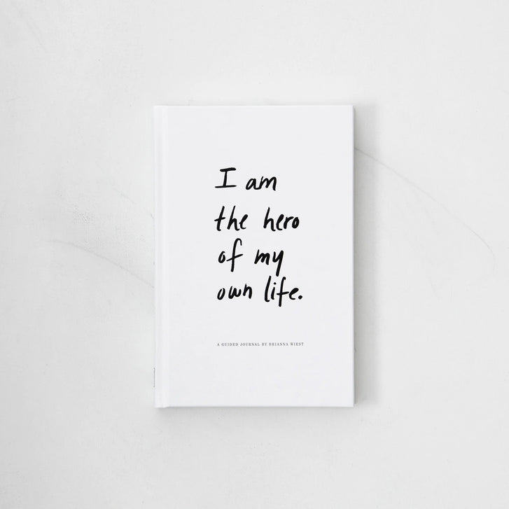 Exterior of self-guided journal titled, I Am The Hero Of My Own Life written by Brianna Wiest. Hardcover version.