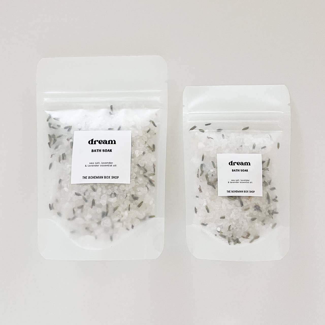 All natural bath salts by The Bohemian Box Shop. Dream consists of dead sea salt, lavender, white sage, mugwort and sage oil. Made in USA.